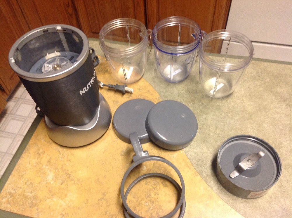 Nutribullet Magicbullet Blender Includes 3 - 20 Oz Cups , 9 pieces total*