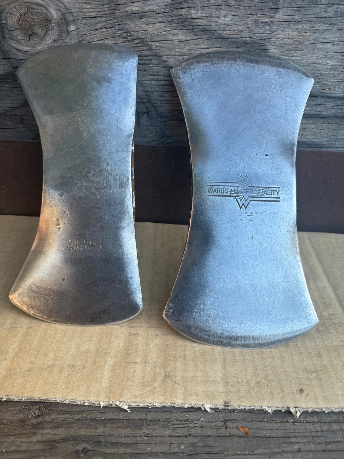 Vintage lot of 4 double bit axes.