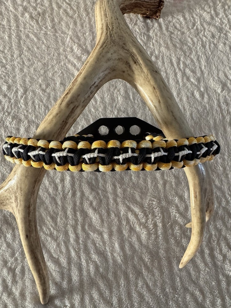Black, Yellow And White Bow Wrist Sling
