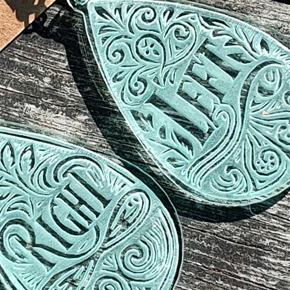 Right and left teardrop dangle earrings