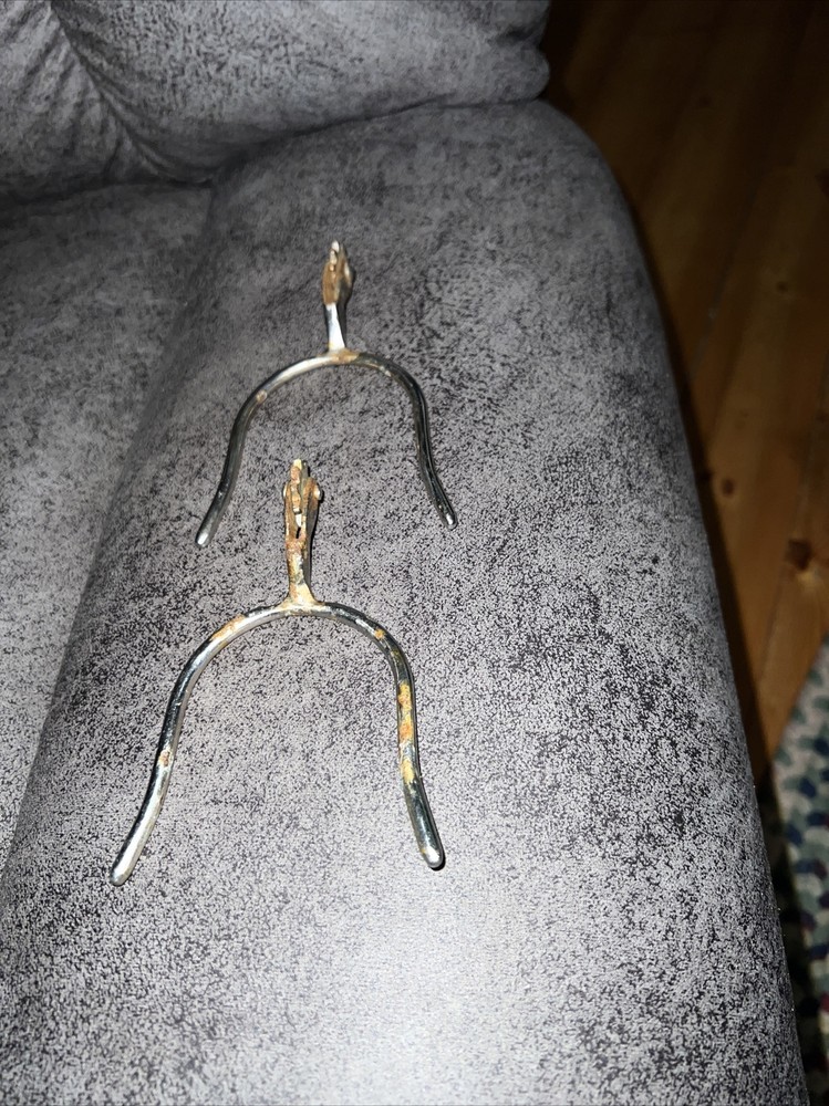 Wishbone Spurs. One Is Slightly Bent