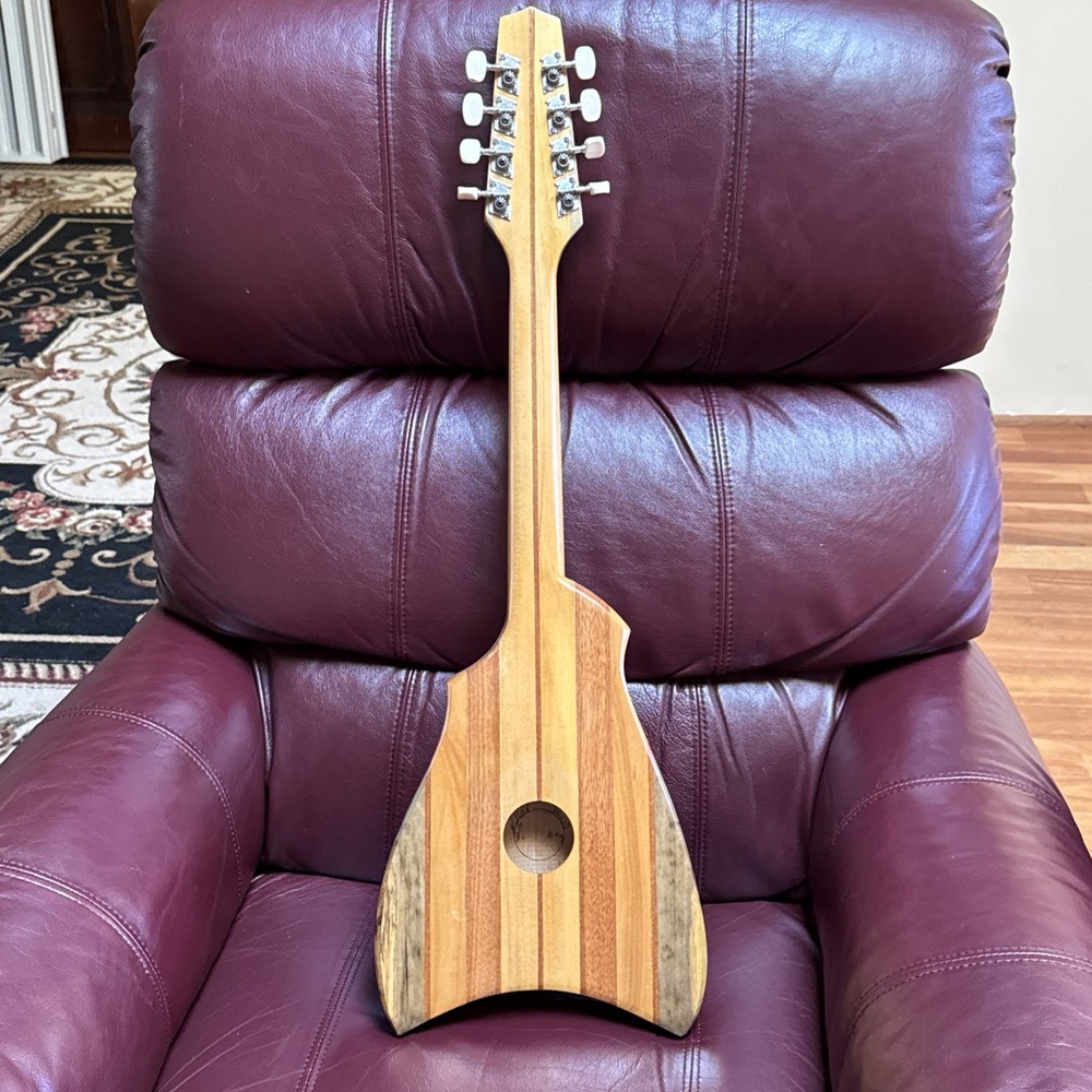 8-string Tahitian Ukulele. Model Featuring A Turtle-shaped Body. Used