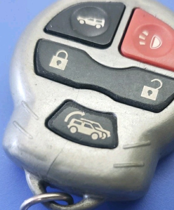 2x USED TESTED WORKING DesignTech ELGTX7 5-Button Remote Transmitter - SILVER