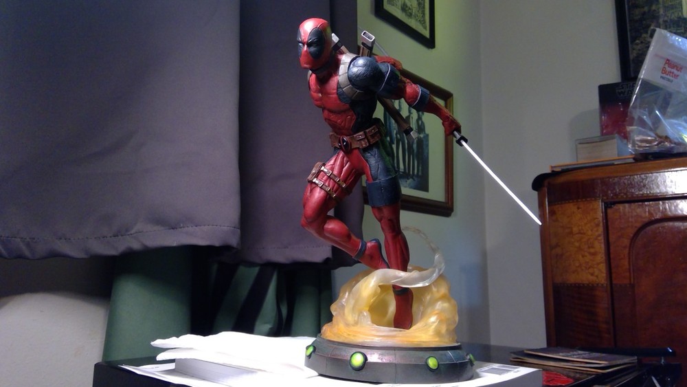 11" Deadpool statue, incredibly detailed and imposing.