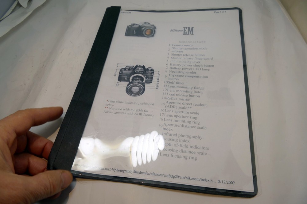 Camera guide instruction manual printed and bound folder for Nikon EM