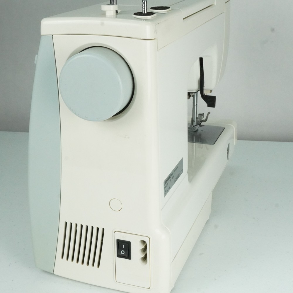 Usha Janome Automatic Stitch Magic Sewing Machine with 57 Stitch Function w/Case