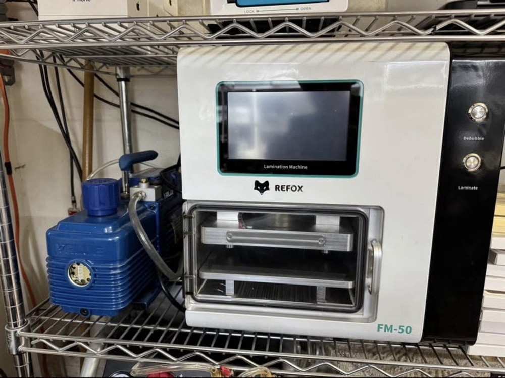Refox FM-50 phone screen lamination machine with vacuum pump.