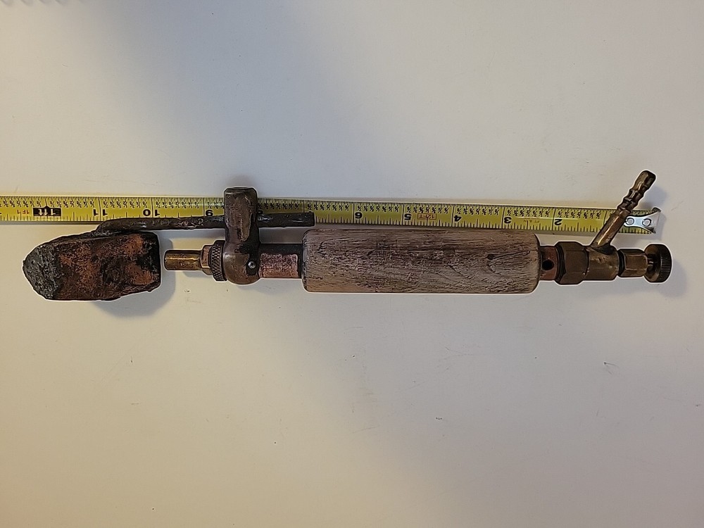 Antique Soldering Iron Blow Torch?