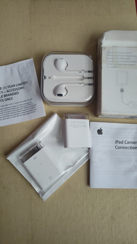 apple ipad camera connection kit + earbuds