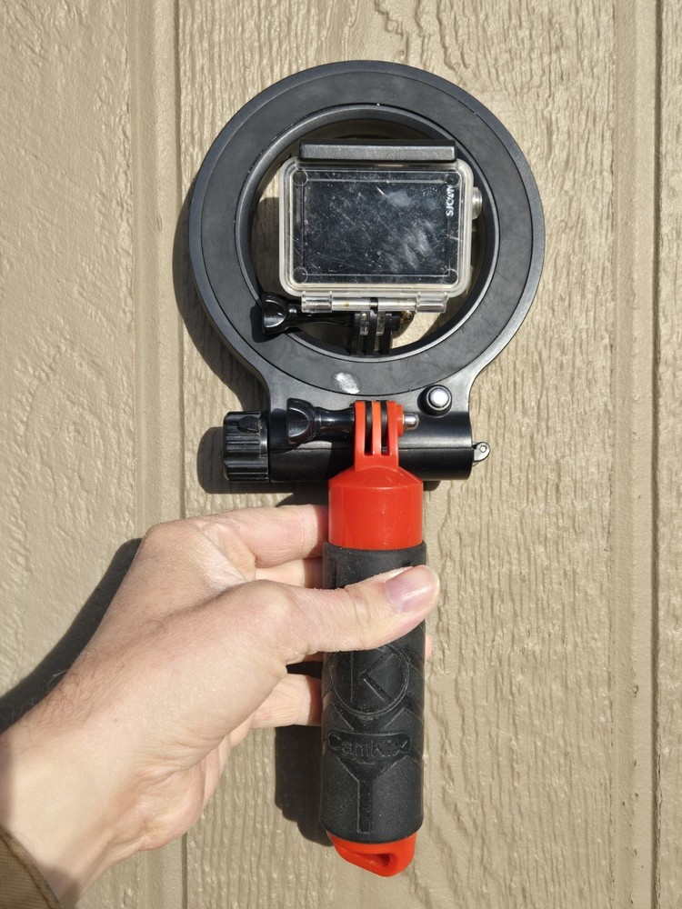 Seafrogs SL-109 ring dive light fitted with an action camera,