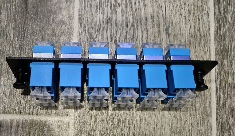 Loaded LGX Adapter Panel with 12x Simplex SC/UPC Singlemode - Black