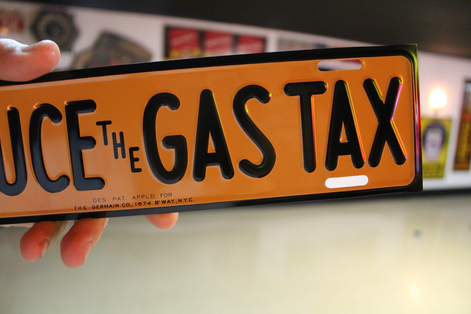 RARE REDUCE THE GAS TAX PLATE TOPPER EMBOSSED METAL SIGN SALES GAS OIL FORD