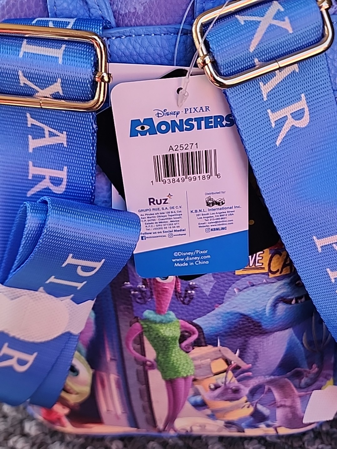 Disney Pixar Monsters Inc. Roz Got My Eye On You 11" Vegan Leather Mini Backpack