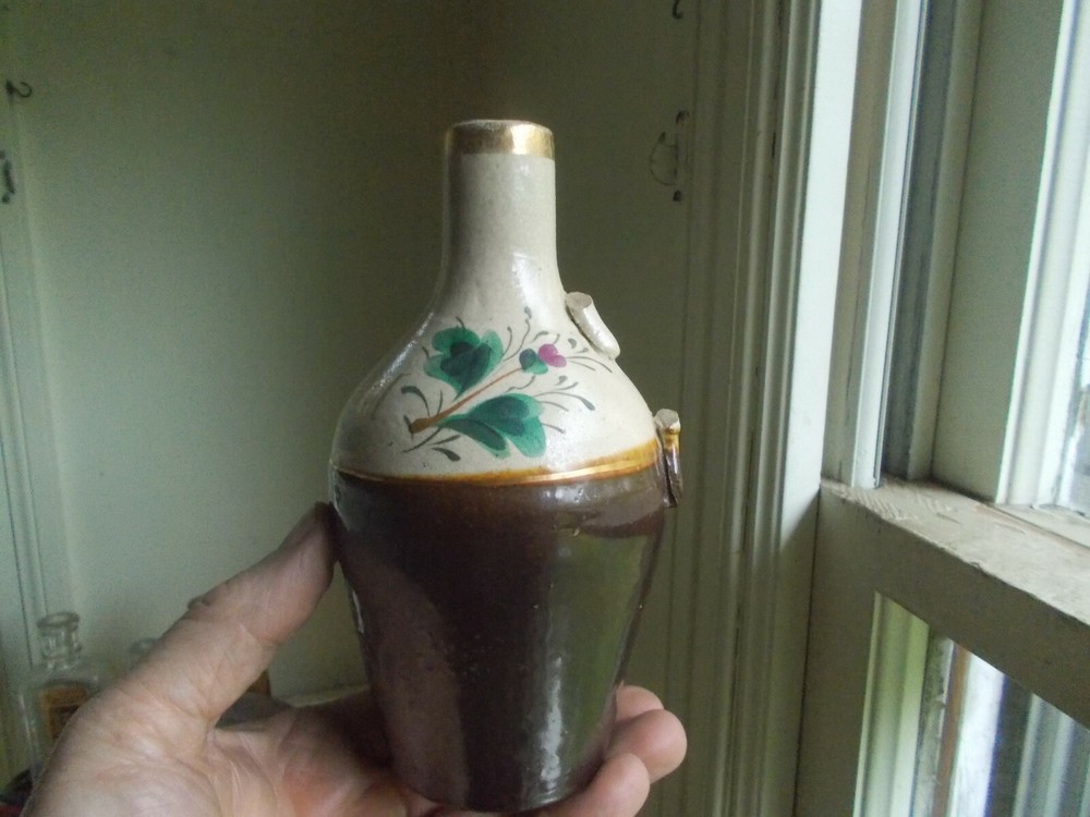 1888 DATED OHIO CENTENNIAL STONEWARE BOTTLE HAND PAINTED FLOWERS HANDLE BROKEN