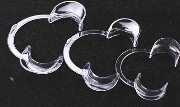 Plastic C shaped mouth retractor