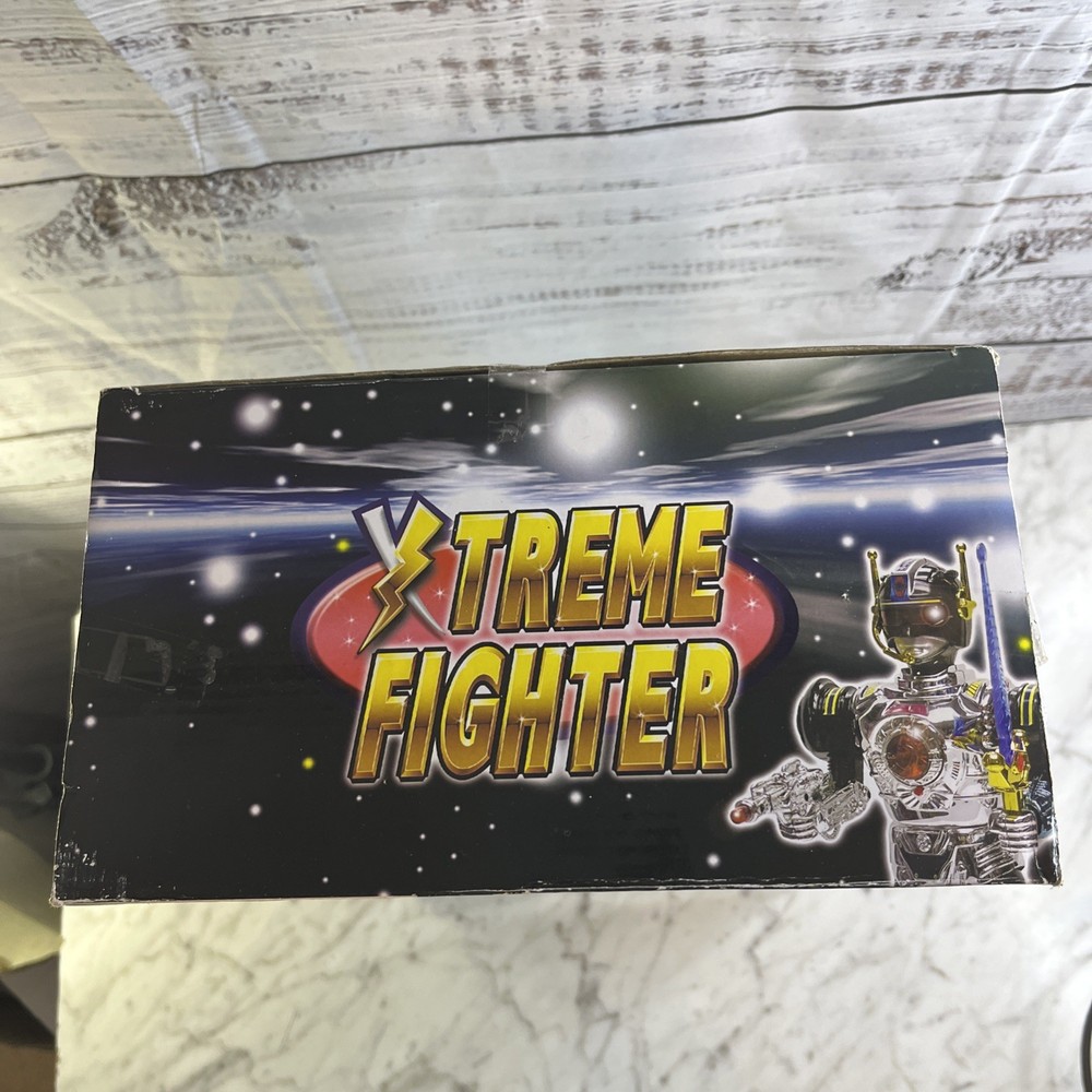 Extreme Fighter Robot Walking Blinking Lights Rotating 360 & Shoot Toy