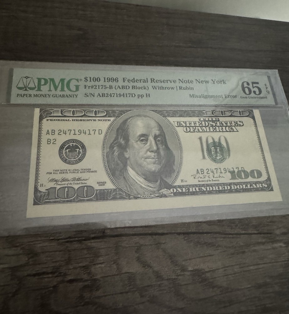 1996 100$  “Mis-Alignment”  P.M.G #65EPQ