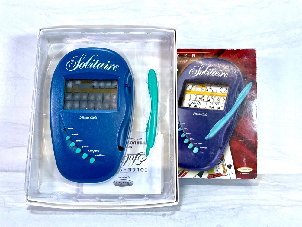 Radica electronic handheld game for playing Solitaire