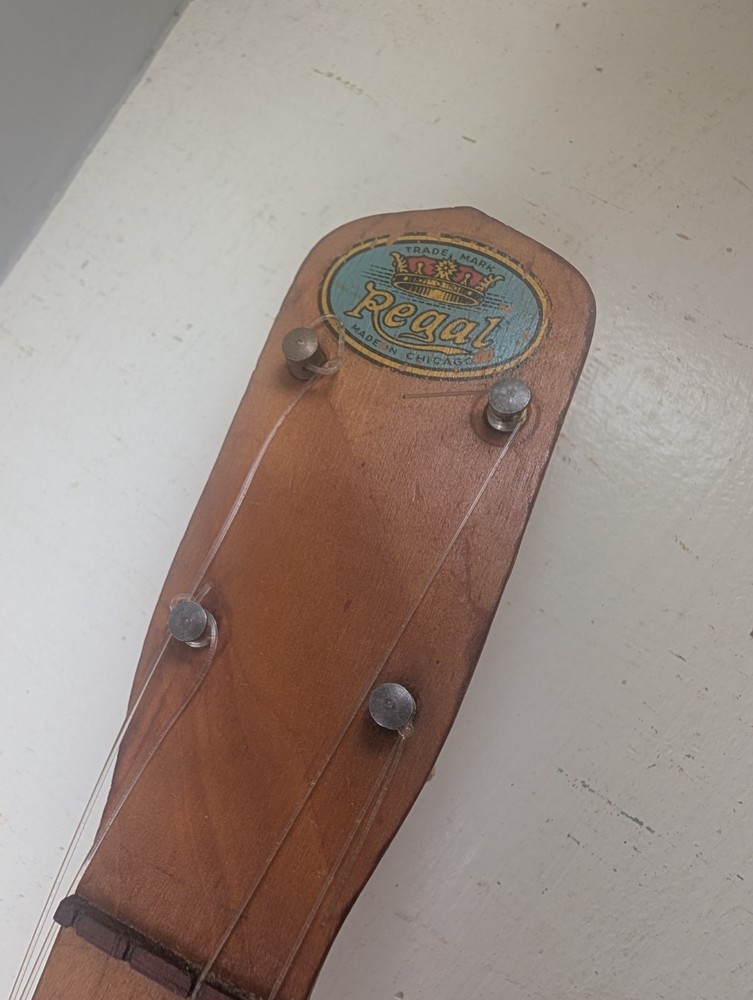Vintage Regal Ukulele w/side crack