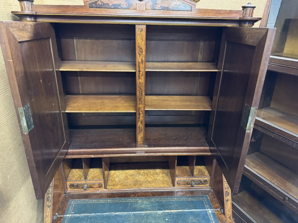 RENAISSANCE WALNUT AND BURLED DROP-FRONT DESK WITH PLAQUES