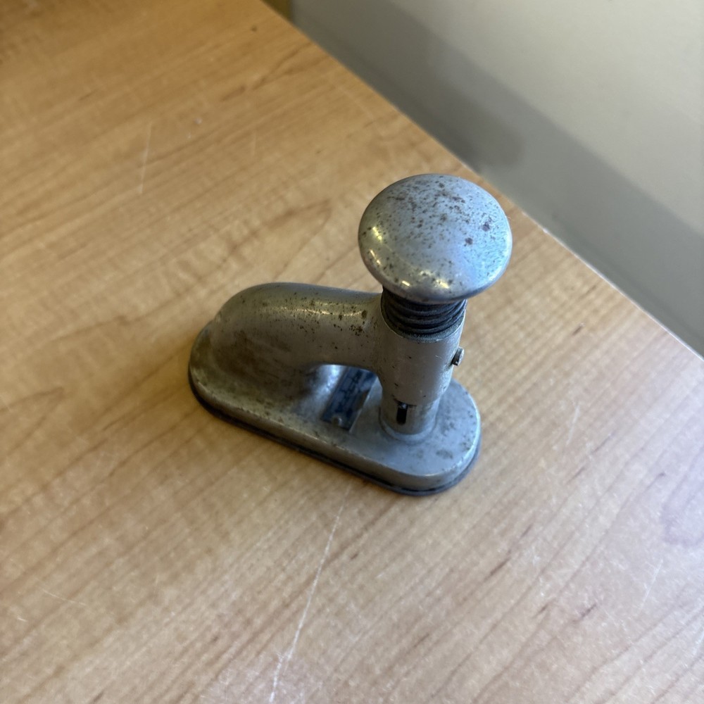 The Clipless Stand Machine - The Clipless Paper Fastener Co. - Newton, Iowa
