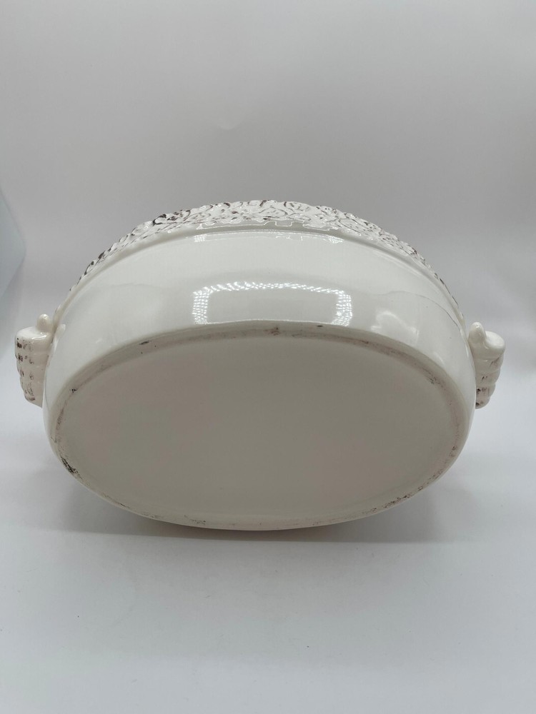Ivory pottery planter with distressed rim