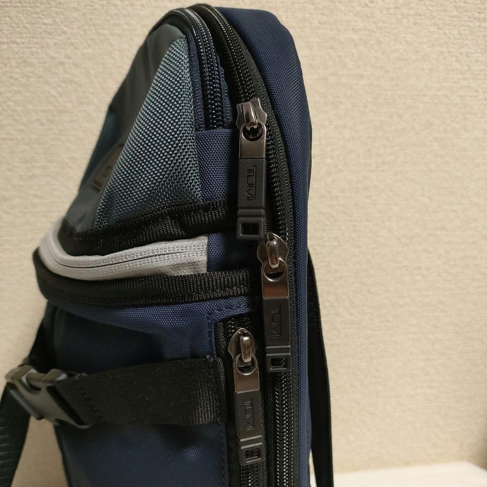 TUMI body bag slingback