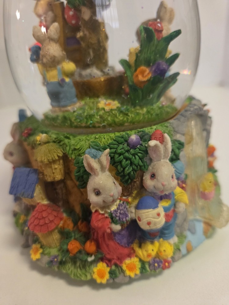 Springtime/Easter musical egg shaped glitter globe plays "Easter Parade"