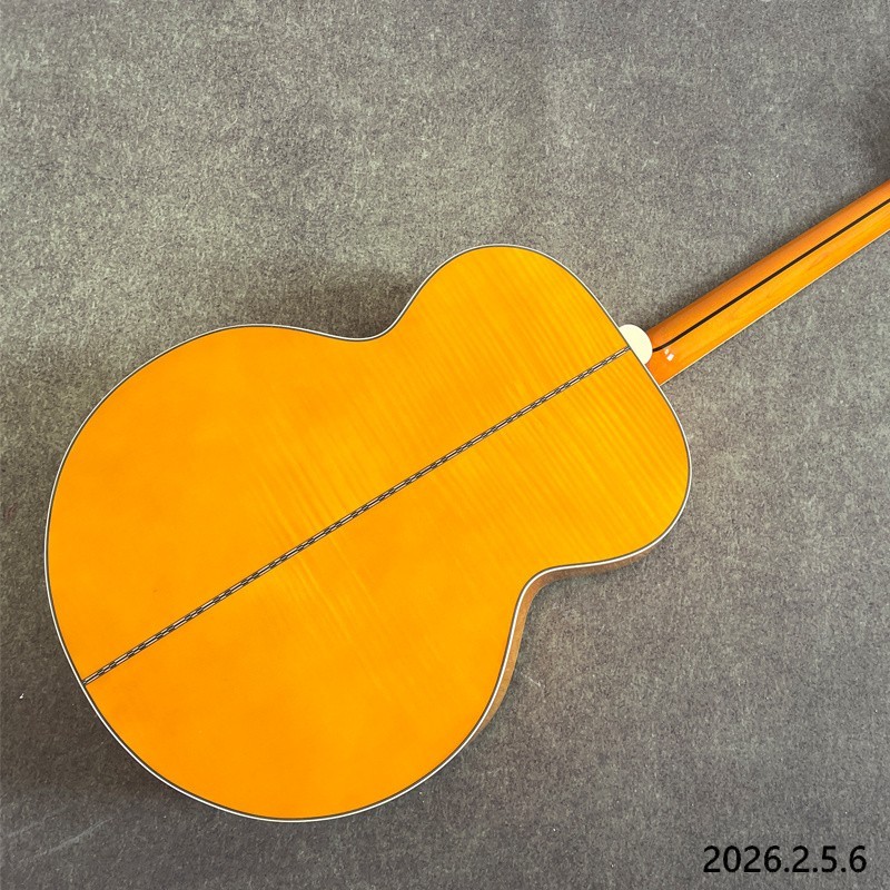 Acoustic guitar yellowish Solid spruce board top maple back and side