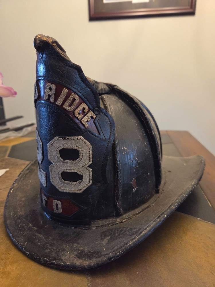 vintage high eagle fire helmet
