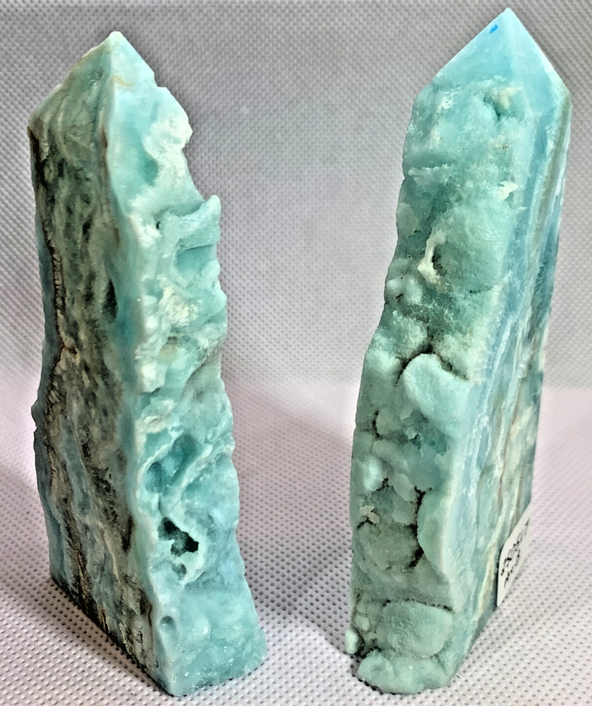BLUE ARAGONITE TOWER PAIR - ICE BLUE WITH THIN BROWN LINES THROUGHOUT