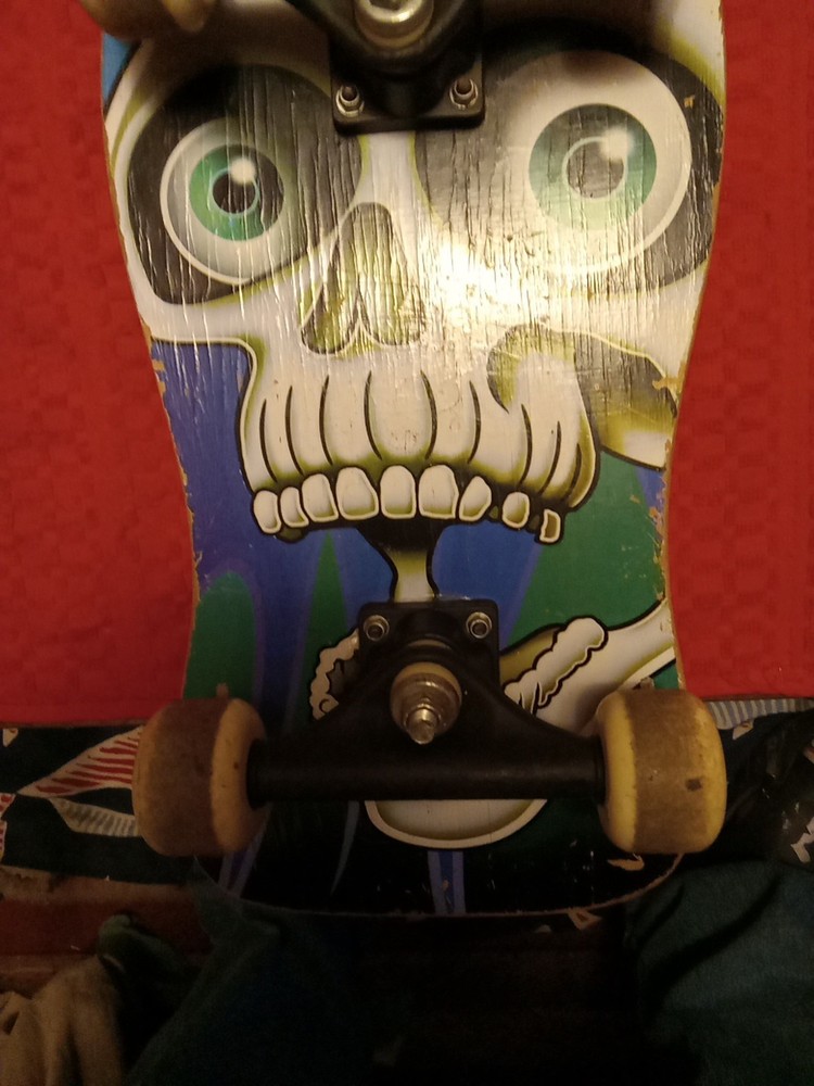 A VINTAGE 18inch×9 Scateboard .