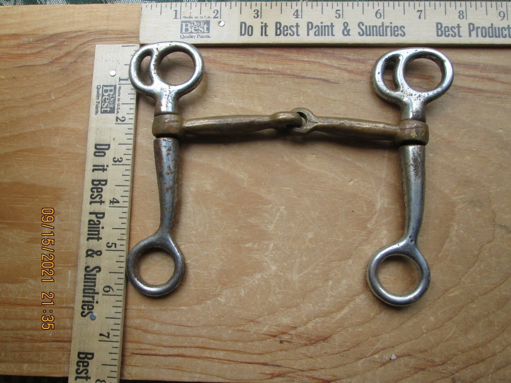 rusty iron & brass horse bit decor