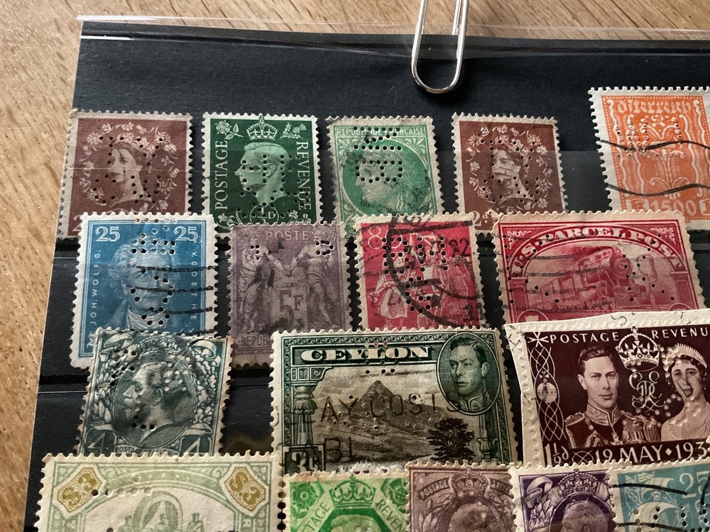 World mixed perfined punched stamps B1636