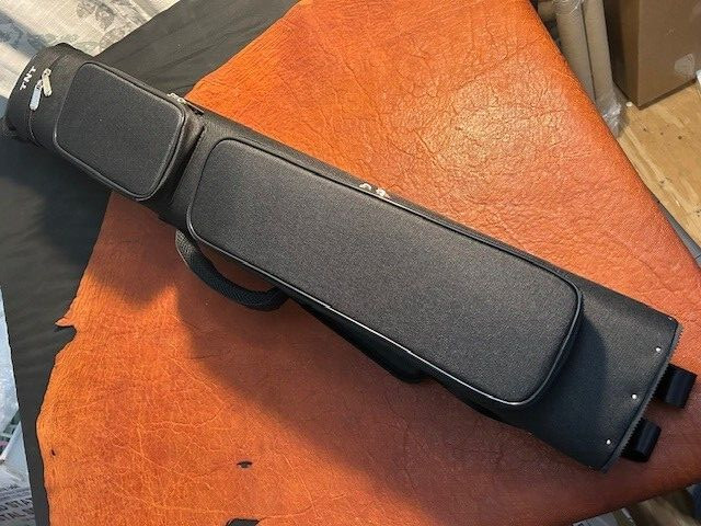 TNT 4x8 Black Nylon Pool Cue Case. Blue interior. Back Pack Straps.