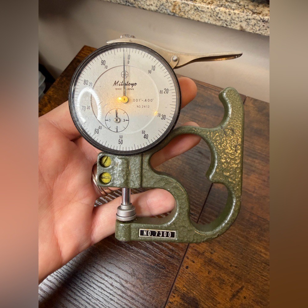 Mitutoyo 7300A Dial Thickness Gauge precision measuring tool.