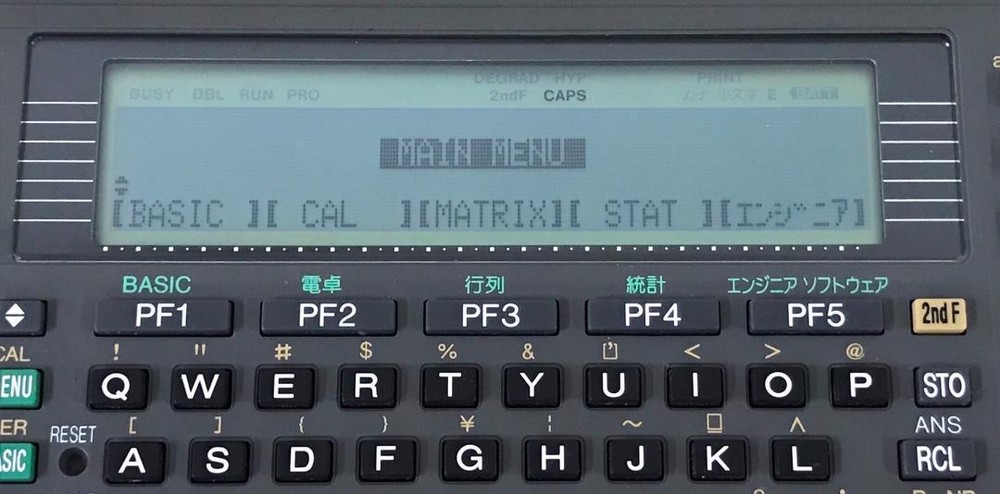 Sharp PC-E500 pocket computer 32KB memory large display BASIC language C338