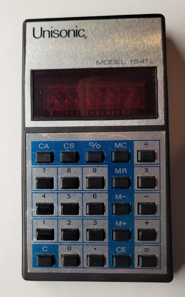 Unisonic Pocket Calculator Model 1541L Chipped Corner. UNTESTED