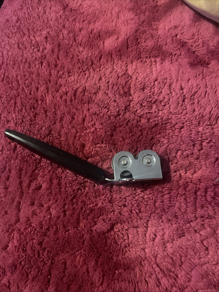 Vintage Ecko Pull Through Chromium Plated Knife Sharpener with Black Handle