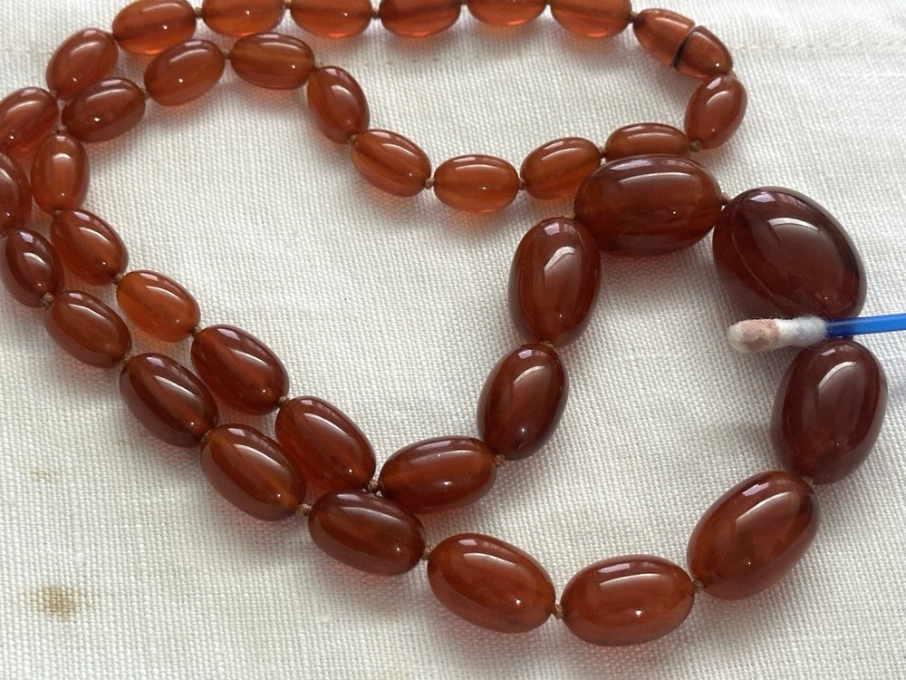 GORGEOUS BAKELITE AMBER GRADUATED  LONG NECKLACE.