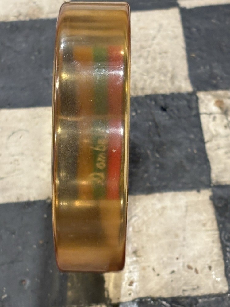 2. Signed Dombek Apple Juice Bakelite Philly Style Bangle