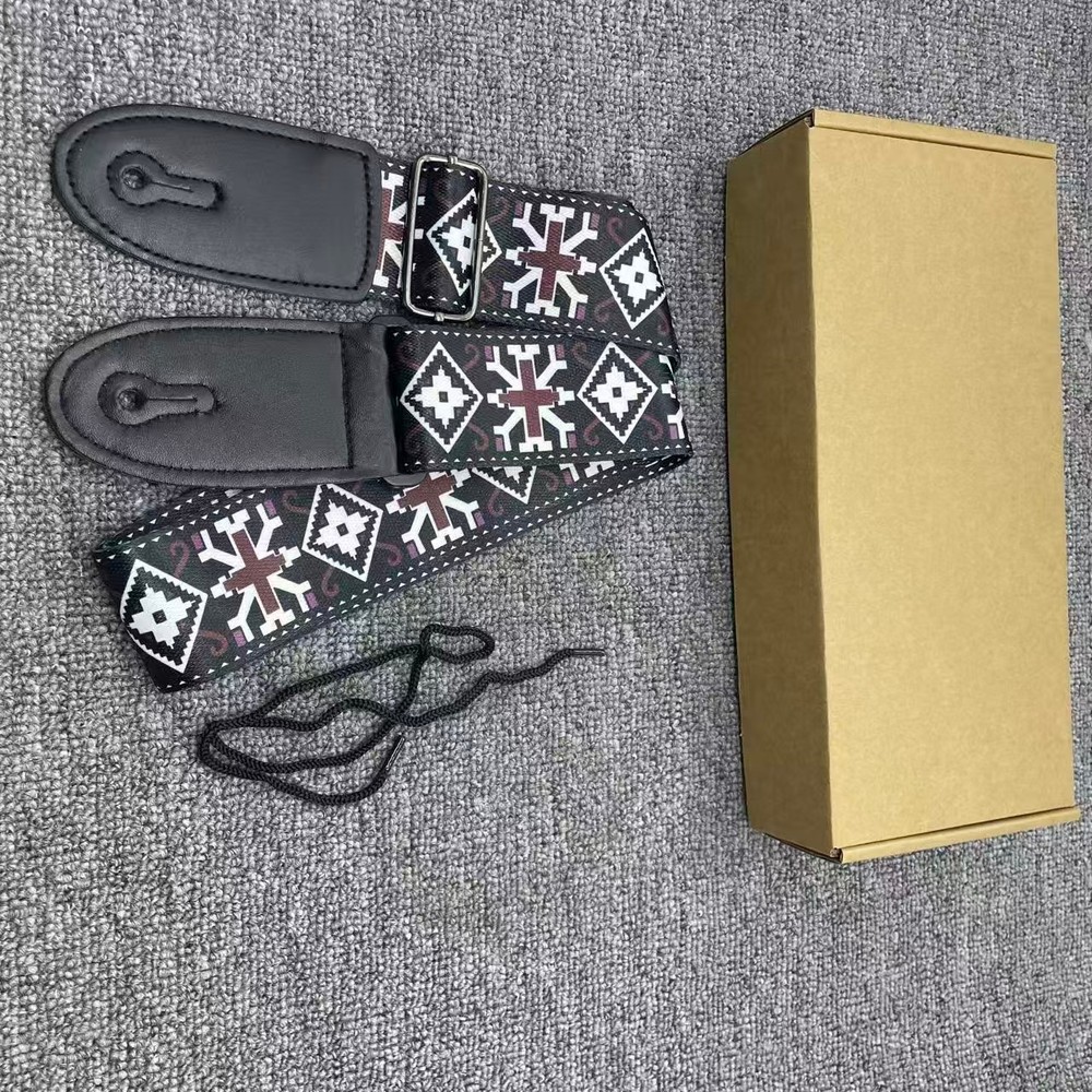 Black checkered pattern guitar strap, highly functional, currently on sale