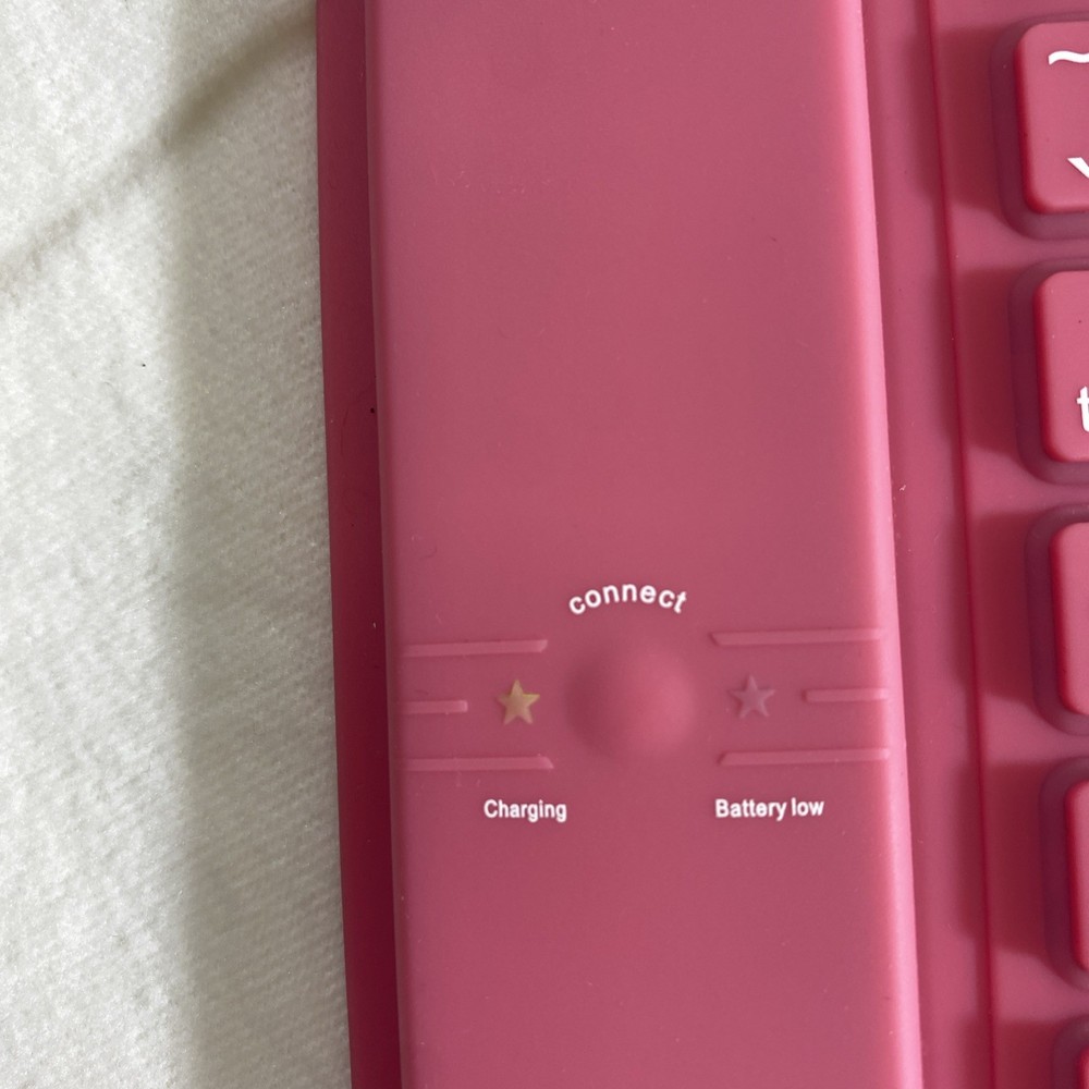 Brookstone Bluetooth Wireless Roll-Up Keyboard 789725 Pink