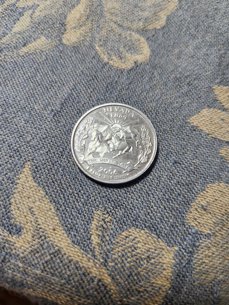 2006 S mint Nevada State quarter, very nice.