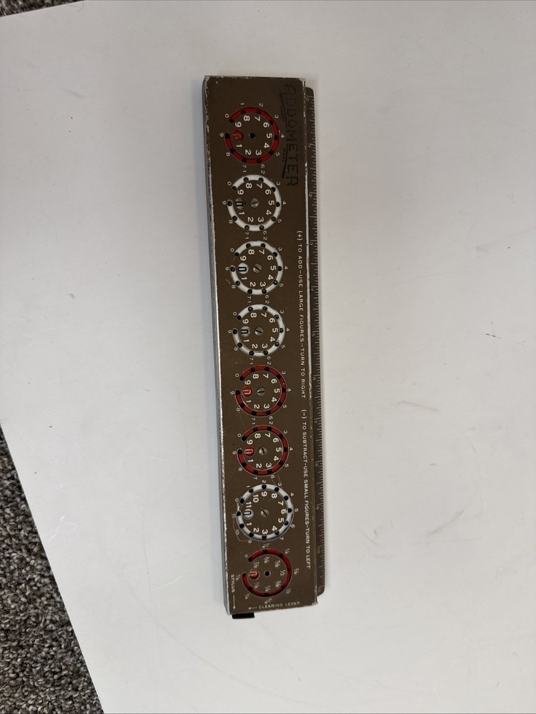Addometer stylus-operated adding machine. Vintage mechanical calculator.