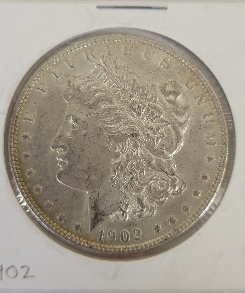 1902-P Morgan Silver Dollar. Unc. Beautifully.