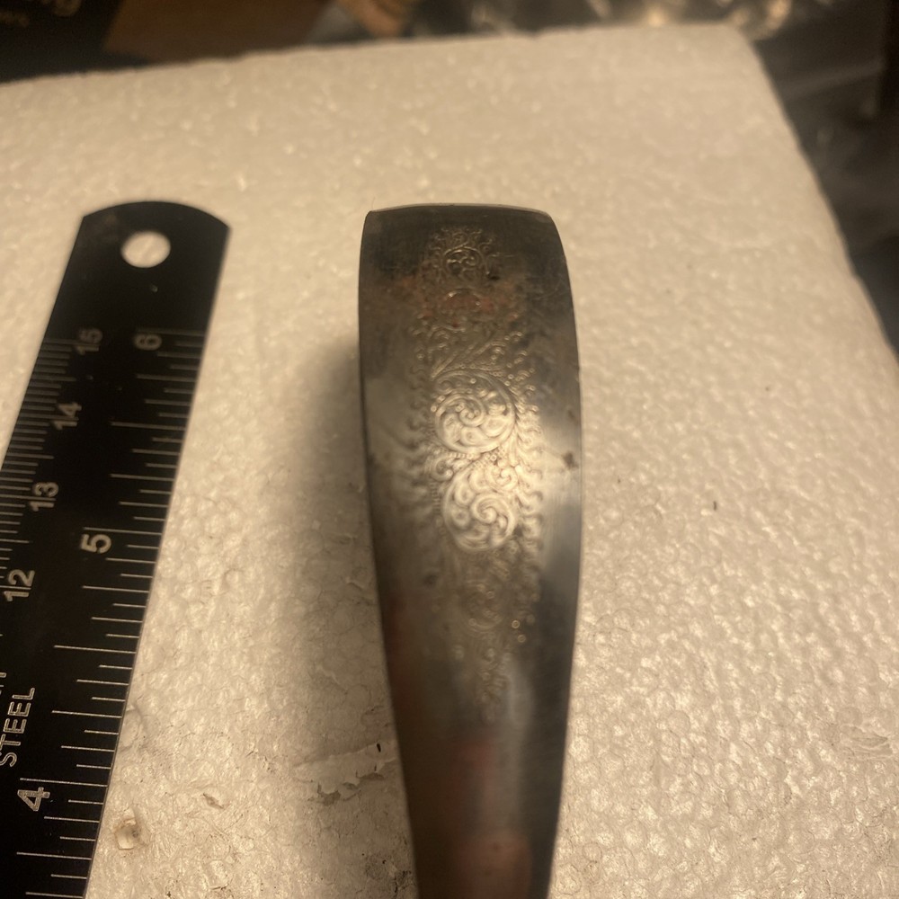 Silver Trigger Guard Of Unknown Brand.