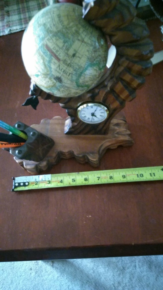 A Very Ornate Desktop Globe With Quartz Clock