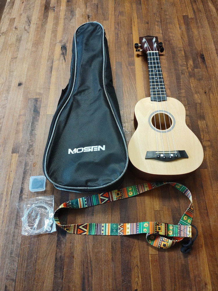 Mosen 21" Ukulele For Beginners Solid Wood Bag Strap Strings Picks Included