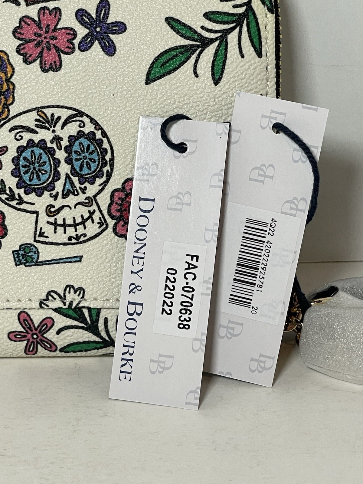 Dooney & Bourke Disney Coco - Miguel Wristlet Wallet - Exact Placement